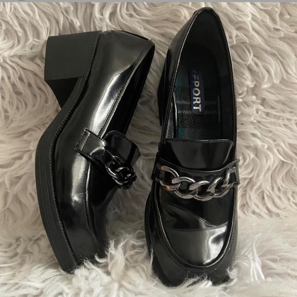 Black platform loafers with chain detailing